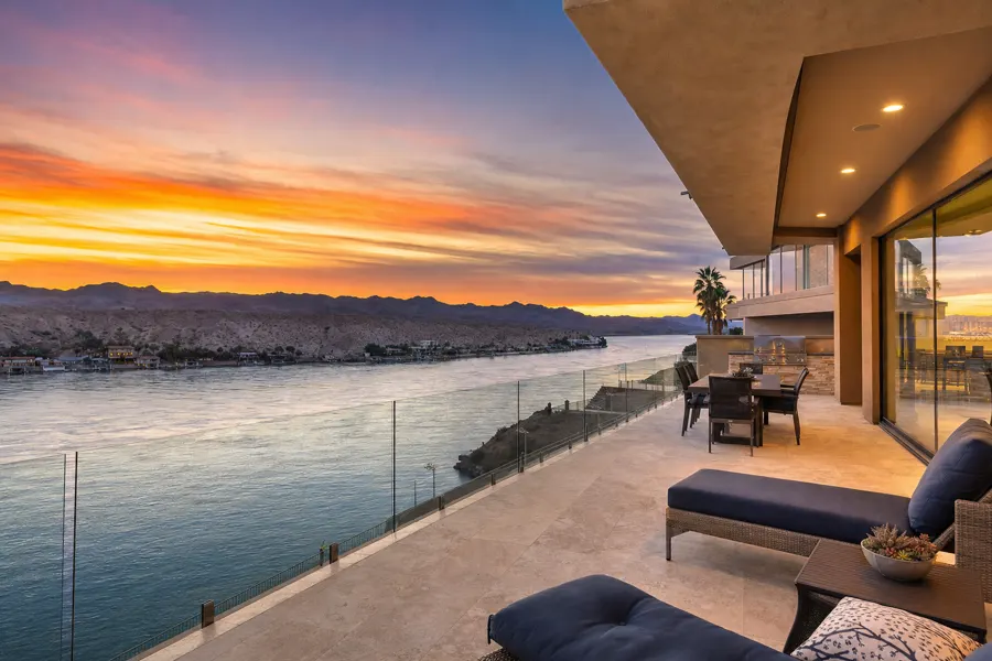 Riverfront terrace overlooking the Colorado River at sunset